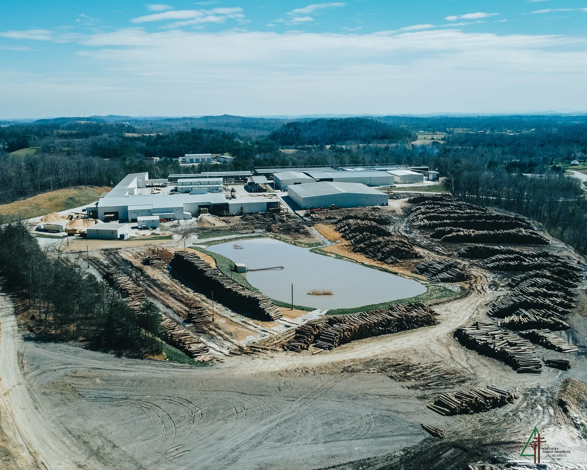 Aerial view of Kentucky Forest Products facility with log yards
